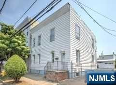 Great investment property-2 Family with a detached two car garage. Conveniently located to shopping centers, dining, public transportation and more. Leveled yard, great for entertaining.