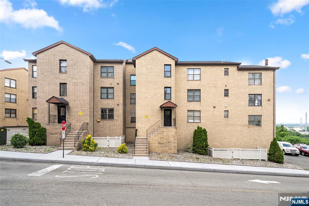 Spacious 1,283 sf condo with attached garage parking. Open living and dining floorplan, hardwood floors throughout, central air, and hot air heat. Enjoy west-facing views on the private balcony which looks towards the Meadowlands. Coin washer/dryer located close to the unit on the same floor. Convenience and comfort define this 2 bed, 1 bath home. HOA is $519/month and includes common area maintenance, landscaping, and snow removal. 1 parking space is included. Good for buyers looking to move in this fall, or investors looking for immediate rental income. Close to the shopping centers on Tonnelle Ave.
