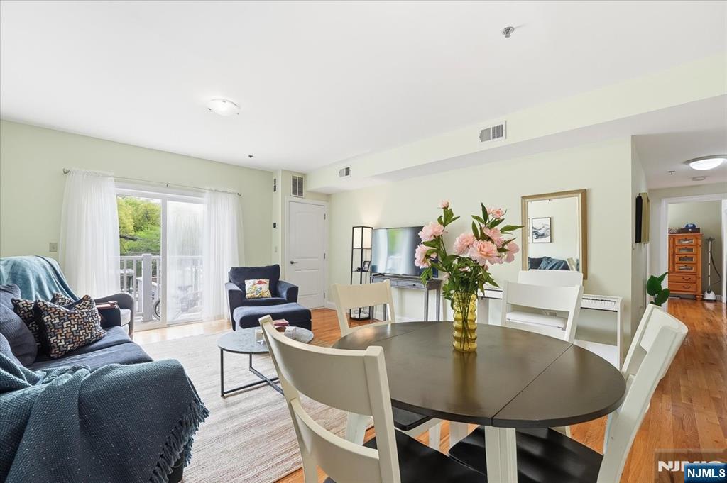 Experience the perfect blend of modern convenience and urban tranquility in this expansive 1,171 square foot residence at Branch Brook Commons. This bright and airy 2-bedroom, 2-bathroom home features a sprawling open-concept living and dining area highlighted by gleaming hardwood floors and a private balcony perfect for outdoor relaxation. The chefâ€™s kitchen comes fully equipped with a suite of stainless steel appliances, premium countertops, and ample custom cabinetry. Retreat to a spacious primary suite boasting a massive walk-in closet and a private en-suite bathroom with a soaking tub and contemporary finishes. The versatile second bedroom is ideally situated for a home office or guest room, located just across from the second full bathroom. In-unit laundry and central heating and cooling ensure effortless daily living. Residents enjoy access to an on-site fitness center and the security of a gated, assigned parking space in a professional elevator building with intercom access and 24-hour surveillance. Located directly across the street from the Newark Light Rail, this home offers a seamless 10-minute connection to Newark Penn Station for an easy commute to Jersey City and Manhattan. You are also just steps away from the historic 360-acre Branch Brook Park, famous for its scenic trails and world-class cherry blossom collection. This move-in-ready condo offers a rare combination of space, security, and unbeatable transit access.