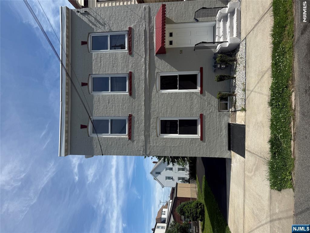 Fantastic two family home on oversized lot. Historic charm meets modern convenience. Just refreshed floor to ceiling, ready to call home. Downstairs unit boats two bedrooms, beautiful designer kitchen and full bath. Unit opens to generous light filled family room that flows into kitchen. In unit washer/ dryer hookups. Central Air! Private rear entrance opens to covered porch. Ample off-street parking on freshly repaved driveway. Upstairs apartment affords spacious floor plan with bedroom, living room, kitchen and full bath. This is the one you have been waiting for!