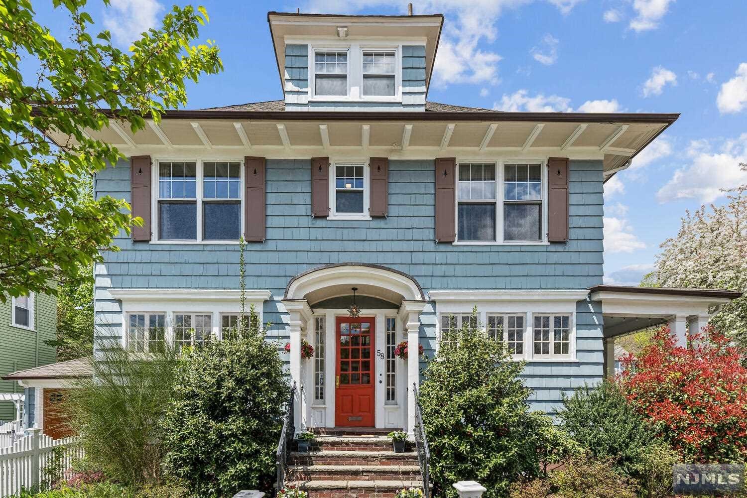 Move right into this sun-drenched Colonial with Craftsman architectural detail including gleaming parquet floors, high ceilings, including a beamed ceiling in the Dining Room, and multiple built in window seats. You will love the updated eat in Kitchen with restaurant range/oven, renovated Bathrooms, and Central Air. The Living Room is straight out of a decorators dream with a large decorative fireplace with window seating on either side. There are French Doors that open onto a glorious side porch overlooking a private enchanting fenced yard. The Dining Room features a beamed ceiling and beautiful windows. An updated Powder Room completes this floor. Upstairs enter an elegant large Primary Bedroom with a walk in closets and even room for your Peleton! 2 additional large Bedrooms, a great updated Bathroom and walk-in Hall closet complete the 2nd floor. The third floor is perfect work at home space or Family/Nanny rooms. Both rooms are sun filled and spacious. The Bathroom is a knoc