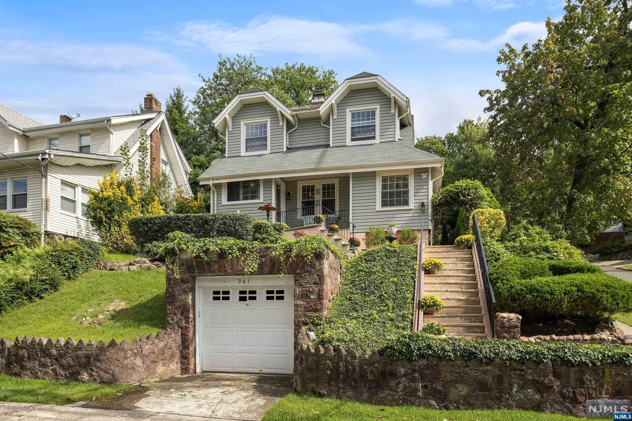 Welcome to 261 Glenwood Avenue, a charming residence nestled in the heart of Leonia. Enjoy the tranquility of this neighborhood while being just minutes away from NYC. As you step inside, you'll be greeted by a living room bathed in natural light, complete with a cozy fireplace that creates a warm and inviting ambiance. The updated kitchen is a chef's dream, featuring granite countertops, stainless steel appliances, and ample cabinet space. With three spacious bedrooms, an office/den, and two and a half baths, this home offers generous living space for all. The backyard provides an idyllic outdoor sanctuary, perfectly suited for hosting guests while maintaining a high level of privacy. 261 Glenwood Avenue is truly exceptional, situated just a block away from Broad Avenue, where you can find most of the local restaurants and retail stores in town. Don't miss the opportunity to make this your forever home!
