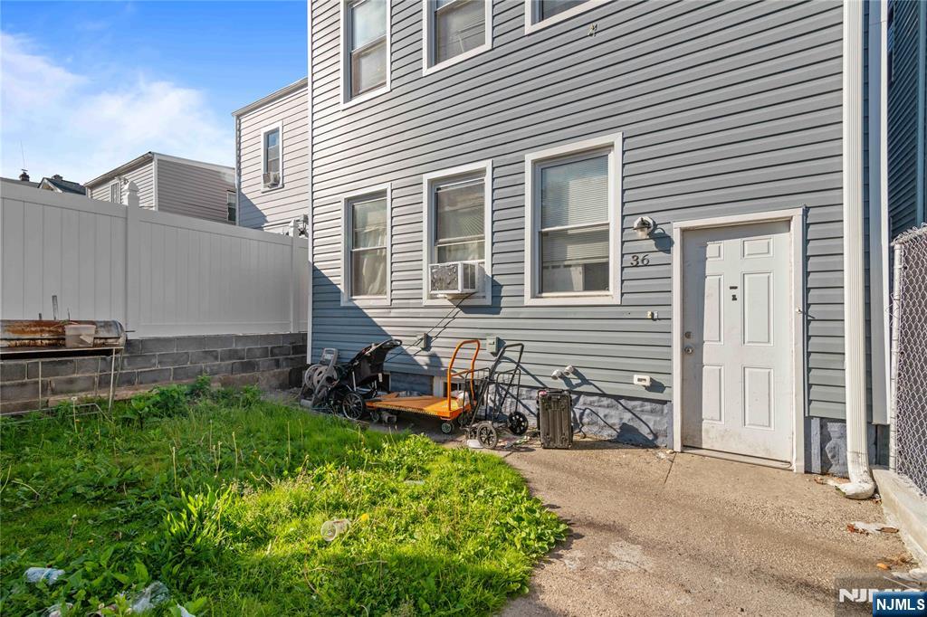 Multi family home with 6 bedrooms 2baths, parking and a full finished basement and separate utilities. Parking in the back of the house. great for rental income.