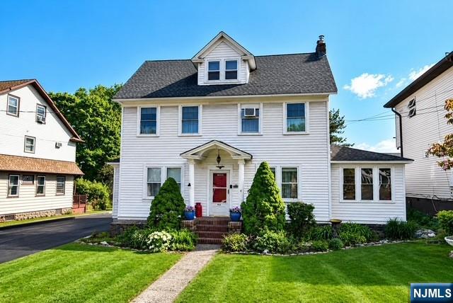 Step into the charm and character of this Center Hall Colonial, situated on an oversized 150ft deep lot with endless potential. This classic home features timeless architectural details, generous living space, and a traditional layout. It offers the perfect opportunity for buyers looking to customize and add their own personal touched. With solid bones, historic charm, and a spacious property, this home is a rare opportunity to create something truly special.
