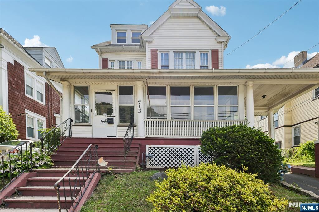 WELCOME TO 711-713 DEGRAW ST! This well-maintained Colonial is located in the sought-after Historic District of Newark's prestigious Forest Hill neighborhood, just blocks from Branch Brook Park, the iconic Ballantine Gates, the Cherry Blossom Center, and the Newark Light Rail Branch Brook Park Station, offering an easy commute to NYC. The inviting open floor plan features an enclosed front porch, a welcoming foyer, a spacious living room, a formal dining room, and a modern eat-in kitchen with ample cabinetry and access to the rear deckâ€”ideal for everyday living and entertaining. This charming home offers three generously sized bedrooms, three and a half bathrooms, and an unfinished basement with laundry and utility areas, providing excellent storage and potential for future finishing. Beautiful hardwood and carpet flooring add warmth and character throughout. Step outside to a large, fenced backyard with a spacious deck, perfect for entertaining, gardening, or relaxing. A private driveway and a car garage provide added convenience. Conveniently located near parks, shopping, restaurants, schools, and public transportation, this home offers the perfect combination of historic charm, modern comfort, and commuter-friendly living. Don't miss this exceptional opportunity to own a home in one of Newark's most desirable neighborhoods!