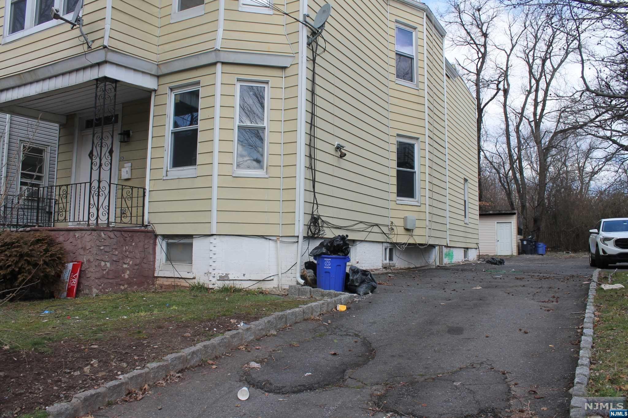 Updated 3 family with full finished basement all units' vacant taxes $6453