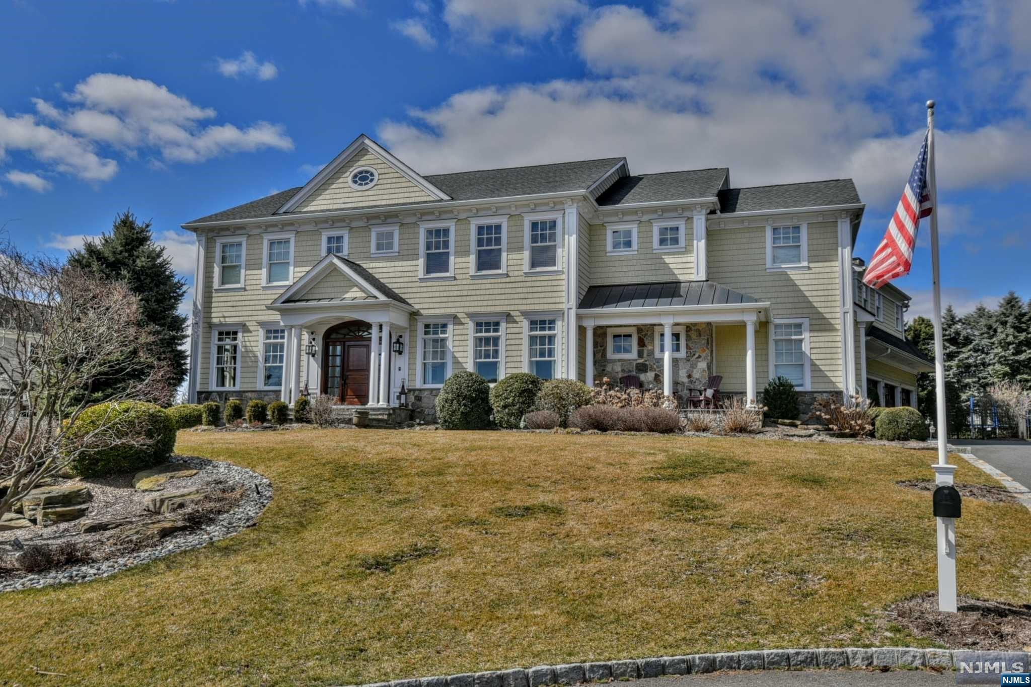 Spectacular Home in Wyckoff!! This is one of the most desirable lots in Sicomac- perched on a knoll w/amazing sunset views, this young home is perfection w/an amazing layout on all 3 floors, high-end products and workmanship throughout.The grand 2-story Foyer w/rotunda and raised panels sets the stage for this beauty including the luxurious dining room, warm library/Living Room, inviting family room that opens to the Gourmet Kitchen. The High-end Kitchen includes a Pantry and Butler's Pantry. The 1st floor also has a guest room/office, full bath, pr, and oversized mudroom w/lockers. The deluxe Primary suite is a dream w/sitting room w/FPL, Marble bathroom and custom closets. Enjoy all the basement has to offer - gym, recreational area, custom wine room and club-like lounge, Fbath + office/rm. The park-like backyard is lush, flat and private, has a great patio w/outdoor kitchen + pergola. The 3-car attached garage also has a car lift! Not a detail was missed - Too much to list!