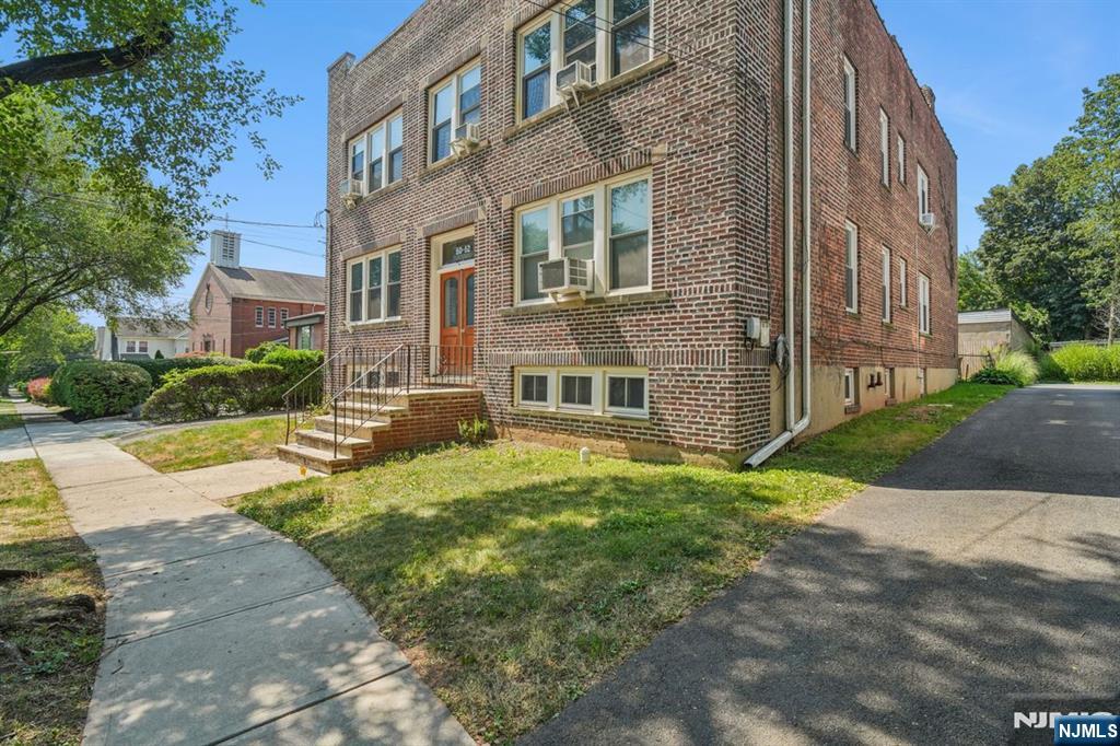 Very spacious 2/3 bedroom apartment on the first floor of a 4 family home. Bright and sunny with new carpet. Laundry in basement. Heat, hot water and a garage are included! Less than 1/2 mile to town, the Montclair Farmers' Market and train to NYC. So convenient!