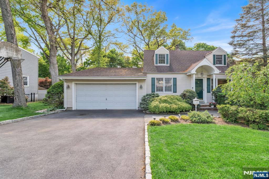Welcome to this expanded Cape Cod nestled on a residential street in the heart of Mahwah â€” one of Bergen County's most sought-after communities. Thoughtfully expanded, this charming 3-bedroom, 2-bath home offers the perfect blend of classic character and modern livability, with new Centra A/C, all wrapped in low-maintenance vinyl siding and gutter-guards keeps this house looking sharp for years. Step inside and be greeted by rich hardwood floors that flow seamlessly throughout the entire home. The main level offers a bright, open feel ideal for both everyday living and effortless entertaining, while the upper level delivers comfortable, private sleeping quarters. Both full bathrooms are tastefully appointed and move-in ready. Outdoor living through the rear door onto a spacious deck overlooking the fully fenced backyard, perfect for al fresco dining, summer barbecues, or simply unwinding at day's end. The private yard is a safe haven for children, pets, and weekend gatherings alike. A 2-car garage adds exceptional convenience and storage, completing this home's practical appeal. Whether you're sheltering vehicles through a New Jersey winter or carving out extra workspace, you'll appreciate the room. Situated on a quiet residential street, yet remarkably well-connected â€” top-rated Mahwah schools, shopping, dining, and major commuter routes including Route 17, I-287, and the Garden State Parkway are all just minutes away. Don't miss your opportunity to own this Mahwah home!