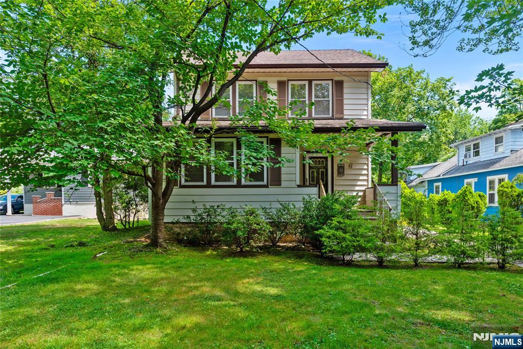 Charming Colonial Home in the Desirable Pleasantdale Section of West Orange. Step back in time with this beautifully maintained 1920s Colonial residence, blending historic charm with modern comforts. Nestled on a peaceful cul-de-sac, this spacious property offers a perfect balance of classic elegance and contemporary updates. Features Include: Inviting inlaid wood floors and original oak wood trim, stair railing, doors, and glass doorknobs that showcase period craftsmanship. Bright, airy kitchen with skylight, coriander countertops, and stainless steel appliances, including a Monogram gas commercial stove, Whirlpool refrigerator, and Bosch dishwasher ideal for home chefs. Comfortable living spaces with central air conditioning and radiator heat for year-round comfort. Sunroom filled with natural light, perfect for relaxing or entertaining. Three spacious bedrooms and a full bathroom and half bath provide ample space. Expansive outdoor area featuring a large yard, patio, and deck with a gas connection great for outdoor dining and gatherings. Two-car garage with additional space for a workshop, plus plenty of parking on the driveway. Situated on a quiet cul-de-sac, offering privacy. This home beautifully combines historic character with modern conveniences, making it a truly special place to call home. Don't miss the opportunity to own a piece of West Orange history with all the comforts of today. Schedule your viewing today!