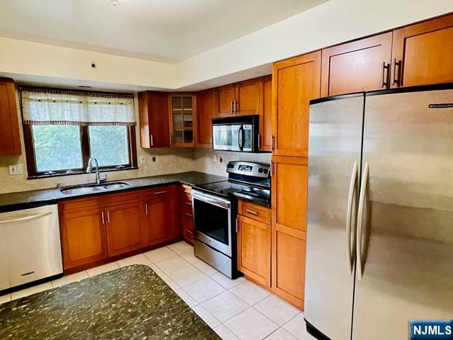 This well-located, renovated two-family house is in Palisades Park on 3rd Street. The first-floor unit features three bedrooms and two full bathrooms. Updates include freshly painted interiors, sanded floors, and steps. Tenants will have access to the yard, one garage space, and an additional parking space. There is also a washer and dryer located in the garage. The property is within walking distance to schools and offers easy access to the NY express buses and major highways.