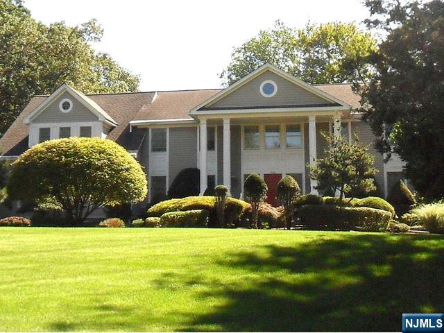 THIS BEAUTIFULLY RENOVATED CENTER HALL COLONIAL HOME OFFERS ELEGANCE AND WARMTH. THIS SPACIOUS HOME ON 1.86AC IS LOCATED IN A MULTI MILLION DOLLARS ON NEIGHBORHOOD OF FRANKLIN LAKES. TASTEFULLY RENOVATED IN 2004 WITH STUNNING CURB APPEAL, NATURAL LIGHT FLOODING HOME ON EVERY LEVEL. SET IN A PRIVATE, CUL-DE-SAC WITH CIRCULAR DRIVEWAY LEADING TO THE FRONT DOOR. THE GRAND ENTRANCE HALL LEADS TO A LIVING ROOM, DINING ROOM, OPEN EAT-IN KITCHEN, WHICH LEADS TO A SLIDING DOOR TO LARGE DECK, OVERLOOKING THE OUTDOOR SWIMMING POOL AND TENNIS COURT TO ENJOY. TWO FIREPLACES ON THE 1ST FLOOR WITH JUNIOR EN-SUITE,2ND FLOOR PRIMARY EN-SUITE, JUNIOR EN-SUITE AND TWO (2) BEDROOMS AND FULL BATHS WILL GIVE PLENTY OF ROOMS TO ENJOY. WALKOUT BASEMENT AND THREE (3) CAR GARAGES, GREAT LOCATION AND SHORT DISTANCE TO MAJOR HIGHWAYS AND HIGH SCHOOL. THIS HOME HAS SO MUCH TO OFFER.SCHEDULE YOUR PRIVATE TOUR TODAY. TENNIS COURT STRICTLY AS-IS.
