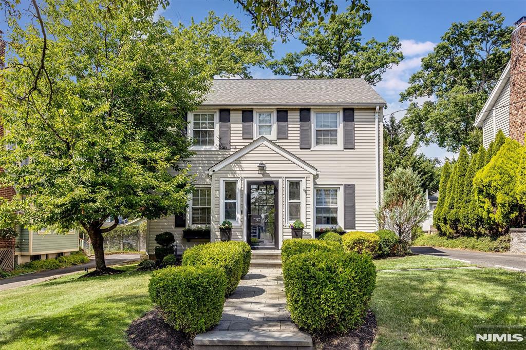 Welcome home to this beautifully updated 4-bedroom, 2.5-bath center hall Colonial in the heart of Verona, where timeless charm meets modern living. A welcoming foyer sets the tone and opens to elegant formal living and dining spaces that flow effortlessly from room to room, creating the perfect setting for both everyday living and entertaining.At the heart of the home is a thoughtfully renovated kitchen featuring stylish finishes and quality upgrades, designed to accommodate everything from busy weekday mornings to memorable gatherings with family and friends. Hardwood floors run throughout the home, adding warmth and character, while updated bathrooms provide a fresh, contemporary feel.Upstairs, generously sized bedrooms offer comfortable retreats for everyone, including a serene primary suite complete with an updated en-suite bath. The versatile floor plan provides ample space to live, work, and relax.Step outside to enjoy the outdoor space, ideal for entertaining, play, or simply unwinding. The detached, finished two-car garage offers endless possibilities whether used for parking, storage, a home gym, workshop, or additional entertaining space.Ideally located close to Verona's top-rated schools, parks, downtown shops, restaurants, and NYC transportation, this exceptional home offers the perfect blend of comfort, convenience, and community. Don't miss the opportunity to make it yours.