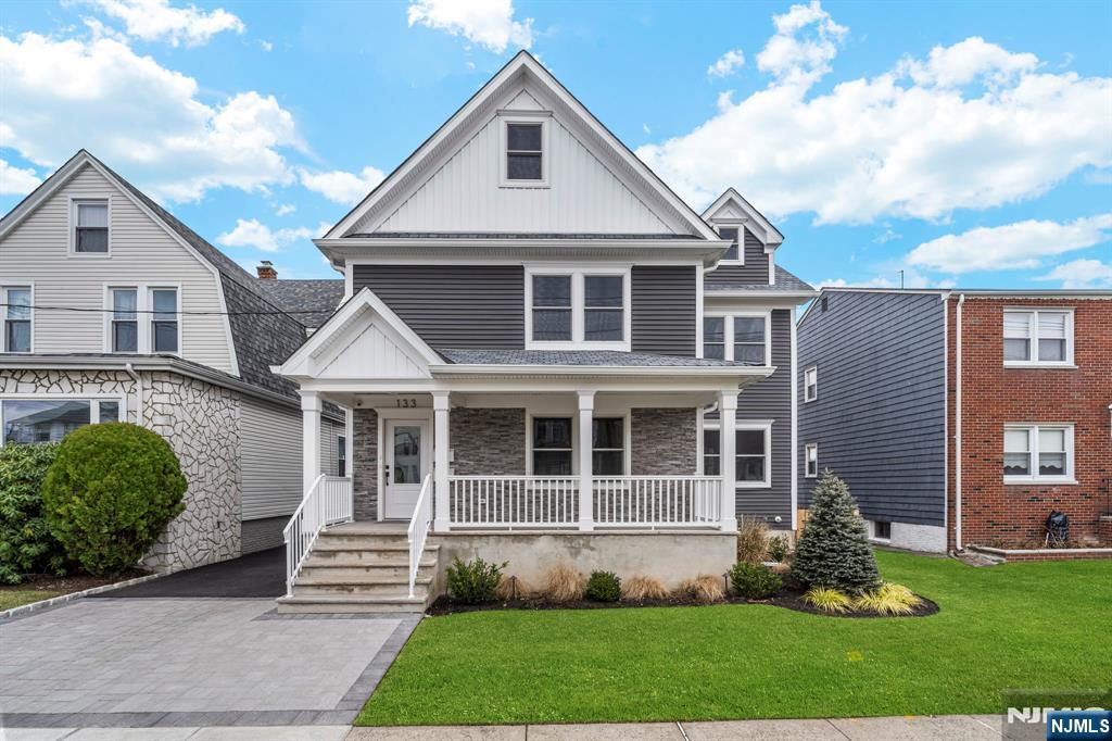 Welcome to this beautifully renovated two-family home located in the heart of Bloomfield! The Property has undergone a comprehensive, full renovation, meticulously upgraded from top to bottom. Each floor features 2 spacious bedrooms and 1 modern bathroom, designed with open-concept living and dining areas. Updated bathrooms feature contemporary fixtures and finishes, ensuring a luxurious feel. Outside, you'll find a lovely pavered yard, perfect for outdoor gatherings and relaxation. The wooden fence provides privacy. Additionally, the large unfinished basement and attic offer abundant storage space and potential for future customization to suit your needs. Located in a vibrant community with easy access to schools, parks, shopping, and public transportation, this home is ideal for homeowners and investors alike.