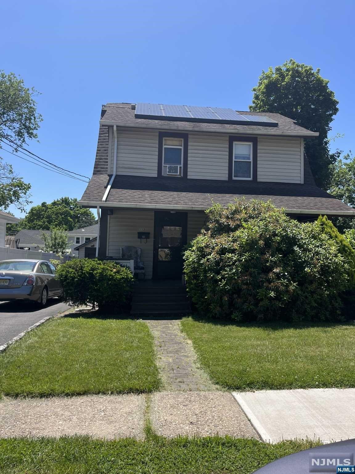 vinyl sided colonial features 3 bedrooms living room dining room kitchen family room and 1.5 baths full basement attic 1 car detached garage on 50x100 lot