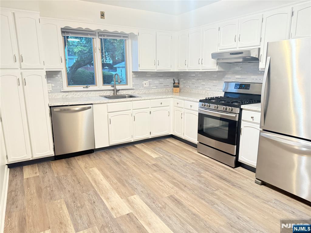 Team Braconi presents a Bright & Spacious updated 3-Bedroom Apartment â€“ Prime Terrace Ave Location, Hasbrouck Heights. Welcome to this large 3-bedroom apartment with a refreshed Kitchen and Bathroom. This well-maintained two-family home in Hasbrouck Heights is bathed in natural light, and offers generous room sizes throughout, providing comfort, flexibility, and the space to live, work, and unwind. Ideally located on Terrace Avenue, this home offers unbeatable convenience with NJ Transit bus service to New York City just steps from your front door. The layout features a large living and dining area, a full kitchen with plenty of cabinetry, and three well-proportioned bedrooms. Additional highlights include ample closets, garage and driveway parking, plus a shared yard. Set in a desirable neighborhood close to shops and dining, this home presents the perfect blend of suburban charm and commuter accessibility.