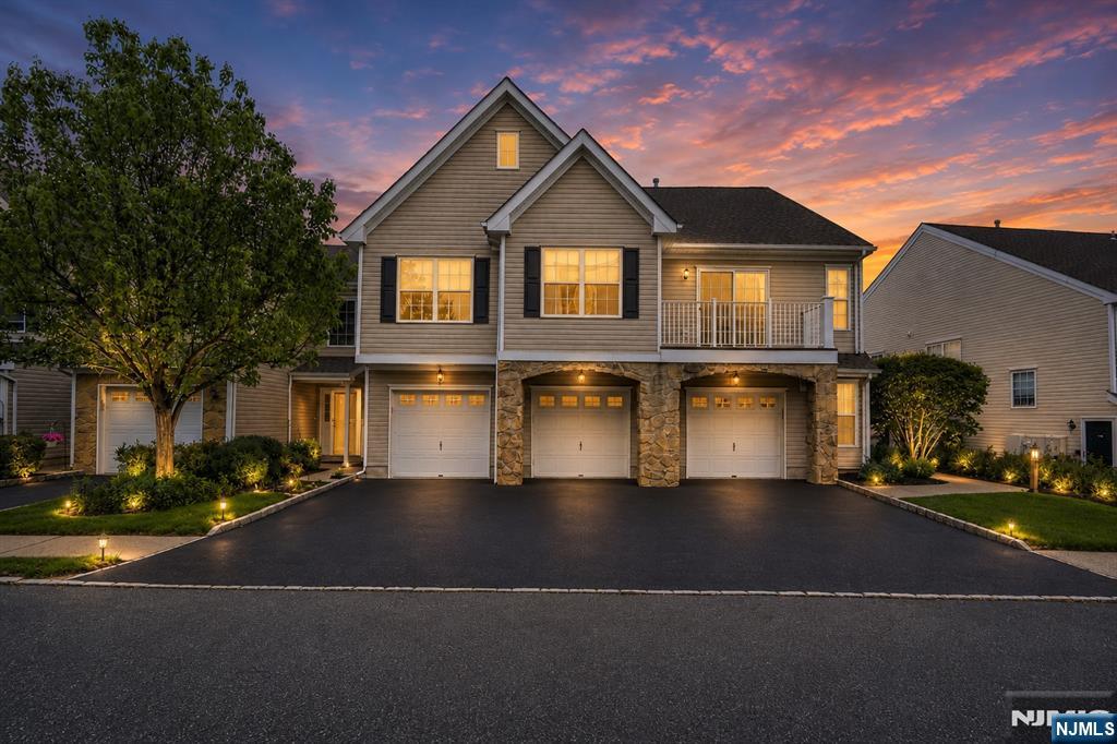 Welcome Home and to THE HIGHLANDS! This beautifully maintained 2/3 bedroom, 3.5-bath end-unit townhouse in The Highlands of Pompton Lakes offers the perfect blend of comfort, style, and versatility. Filled with natural light, the spacious main level features a sun-drenched living room with multiple windows, a cozy gas fireplace, and direct access to an east-facing deckâ€”ideal for enjoying peaceful sunrises. The adjacent dining area showcases custom built-in shelving with ample storage, while the updated kitchen is equipped with granite countertops, newer stainless steel appliances, generous cabinetry, and a pantry. A convenient half bath and a laundry room with direct garage access complete this level.Upstairs, the primary suite serves as a serene retreat with a walk-in closet and a well-appointed en-suite bath featuring a soaking tub and separate shower. A second bedroom and an updated full bathroom complete the upper level.The walkout lower level offers exceptional flexibility, featuring a renovated full bathroom, two large closets, and ample living spaceâ€”perfect for a home office, gym, entertainment area, or guest suite. With the potential to function as a third bedroom, this level adds tremendous value and versatility. Additional highlights include a newer HVAC system, making this home truly move-in ready.