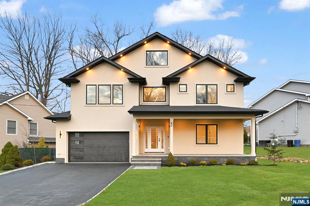 NEW CONSTRUCTION home in Livingston. Set on over .21 acres, 6BD, 5.5BA residence offers 4000+ sq ft of luxury across 3 levels. When you enter the home through the covered entry porch you are greeted by a grand double-height foyer. On the main level, find a beautiful open layout including a formal LR, sophisticated DR, guest ensuite & stylish powder room. The FR flows seamlessly from the kitchen & includes an elegant electric fp & sliding doors leading to a deck overlooking the flat fenced in backyard. Upstairs 4BD, including a primary suite w/ his & her walk-in closets, extra storage closet & spa-inspired BA featuring a soaking tub, stall shower, and dual sinks. 1 BD is en-suite while the other 2 share a full BA. A convenient laundry is also on this fl. The finished basement provides additional living space w/ an additional BD w/ walk-in closet space, a large rec room & full BA & special feature wet bar. Modern smart home features & a 10-yr builder's warranty ensure peace of mind.