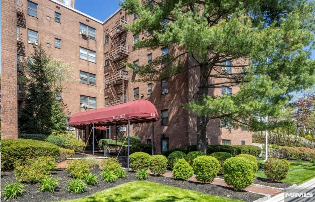 Commuters Dream! 451 SqFt condo with one bedroom & one full bathroom on ground floor. Open layout living room and eat in kitchen separated by large island. Stainless steel appliances including gas stove, microwave, dishwasher & refrigerator and granite countertops. Wall AC units. Heat & hot water included. Elevator building with intercom & security. Shared coin/card operated laundry in basement along with storage area and bike rack. Bus to NYC in front of complex, walking distance to train to NYC and close driving proximity to Rt 17, Rt 3 and NJ Turnpike.