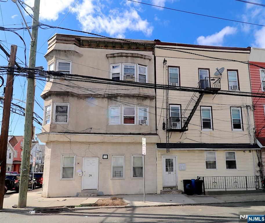 Welcome to 30 Fleming Avenue â€” Comes with Extra Parking! This fantastic, well-maintained three-family home is conveniently located in the highly desirable Ironbound neighborhood of Newark. Enjoy exceptional convenience with easy access to Newark Liberty International Airport, Downtown Newark, major public transportation, and an easy commute to New York City. This spacious property features functional kitchen, living, and dining room combinations, along with a mix of 2- and 3-bedroom layouts in each unit â€” ideal for both owner-occupants and investors alike. The property has separate utilities, although the current owner is paying for them. A bonus is the extra parking, a rare and valuable feature in the Ironbound area. Donâ€™t miss this incredible opportunity to own a versatile multi-family property in one of Newarkâ€™s most vibrant and growing communities!