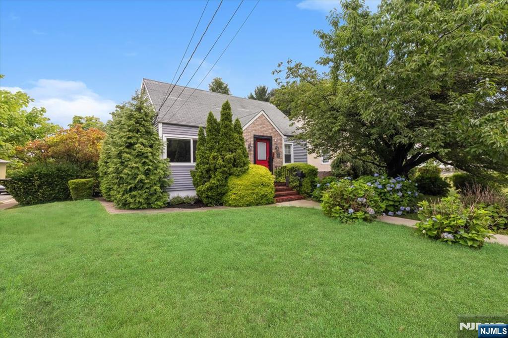 Welcome to this beautifully updated 3-bedroom, 2.5-bath home offering the perfect combination of modern style, comfort, and convenience. The first floor features a stunning eat-in kitchen designed to impress, complete with granite countertops, a waterfall peninsula, stainless steel appliances, a farmhouse sink, and plenty of space for casual dining. The spacious living room is filled with natural light and offers direct access to the backyard, creating a seamless indoor-outdoor flow that's perfect for entertaining. A stylish half bath and a spacious primary suite with a walk-in closet and a beautifully appointed private bath complete the main level. Upstairs, you'll find two generously sized bedrooms and a modern full bath with a tub, providing comfortable accommodations for family or guests. The finished basement offers exceptional versatility and can be used as a recreation room, family room, home office, gym, or guest space to suit your lifestyle. Step outside to a large, fully fenced backyard, ideal for summer barbecues, outdoor gatherings, or simply relaxing in your own private retreat. A two-car garage and an additional two-car driveway provide ample parking and storage. Ideally located within walking distance to the town pool and top-rated schools, and just minutes from shopping, restaurants, and transportation, this move-in-ready home offers everything today's buyers are looking for. Don't miss the opportunity to make this exceptional property your next home!