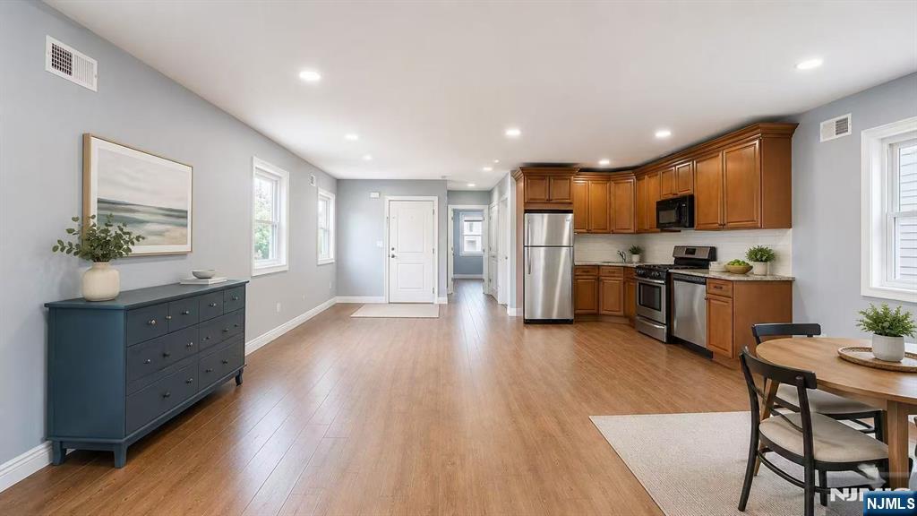 Looking for a spacious and updated apartment to rent in Wallington, NJ? Look no further! This first-floor unit boasts 3 bedrooms and 1.5 bathrooms, with access to a yard and plenty of parking space. The basement even has washer and dryer hookups for added convenience. Optional driveway (2) parkings available, per parking space $100/monthThe apartment features newly updated bathrooms and kitchen, freshly painted walls, and an open space layout perfect for entertaining guests or just relaxing at home. Located in a quiet neighborhood, this apartment offers a peaceful atmosphere while still being close to all the amenities you need.1-year lease. Tenants pay own gas, elecrtric and 1/2 of water bill.Use of yard included. No smoking. No pets. Tenants are responsible for shoveling their side of the parking area. Owner takes care of lawn and yard maintenance.Move-in requirements: 1 month's rent in advance and 1.5 months security depositBackground check, ID, and proof of income required.