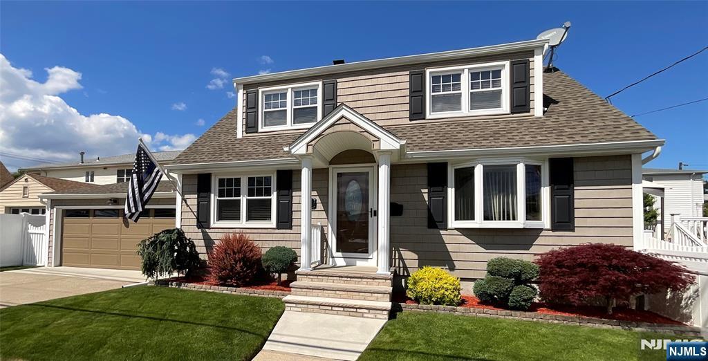 Welcome home to this impeccably maintained, move-in-ready residence designed for both effortless daily living and spectacular entertaining. From the manicured professional landscaping to the pristine interior, every detail of this 4-bedroom, 2.5-bathroom property has been thoughtfully curated for the modern buyer.Step inside to find a bright, interior blanketed in gleaming hardwood flooring. The heart of the home features a sleek, modern kitchen equipped with premium quartz countertops, ample storage, and high-end finishes perfect for culinary enthusiasts. Central air conditioning ensures absolute comfort throughout the changing seasons.The versatile floor plan offers four spacious, light-filled bedrooms and beautifully appointed bathrooms. Downstairs, a fully finished basement provides the ultimate bonus spaceâ€”ideal for a media room, home gym, office, or play area. Step out back into your own private retreat. The beautifully manicured yard hosts a heated above-ground pool, extending your swim season and creating the ultimate backdrop for summer barbecues and weekend relaxation.This turnkey gem offers the perfect blend of modern upgrades and lifestyle amenities. Schedule your private tour today before it is gone!