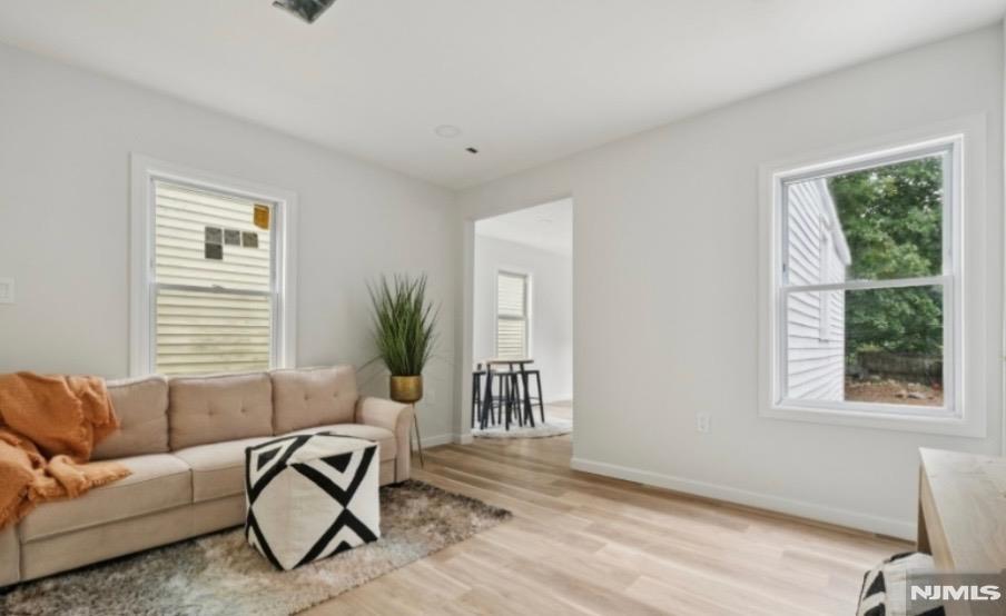 Step inside this fully redesigned charming home at 76 Mitchell Ave. Modernized brand new kitchen with stainless steel appliances & quartz style countertops. Well appointed generously sized first floor bedroom. Enjoy the bright airy freshly painted interior. The residence also features two second floor bedrooms in addition to a newly designed full bathroom. Basement is full & unfinished. The exterior offers enhanced curb appeal. The new crisp siding makes this residence look bright, clean & welcoming. Enjoy leisure in your fenced in backyard. Offering easy direct access to major highways for a commuters convenience. Seller is a licensed agent.