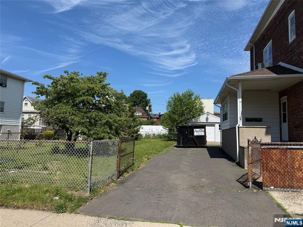 A rare opportunity to purchase this two family in addition to the side lot totaling 75 x 100 (7205 square feet). The first floor has a 2 bedroom apartment and the second floor has a 1 bedroom apartment. Two separate heating systems, two separate hot water system, two separate electric meters. Full basement. Sold strictly as is. The buyer is responsible for any kind of certificate required by the town.