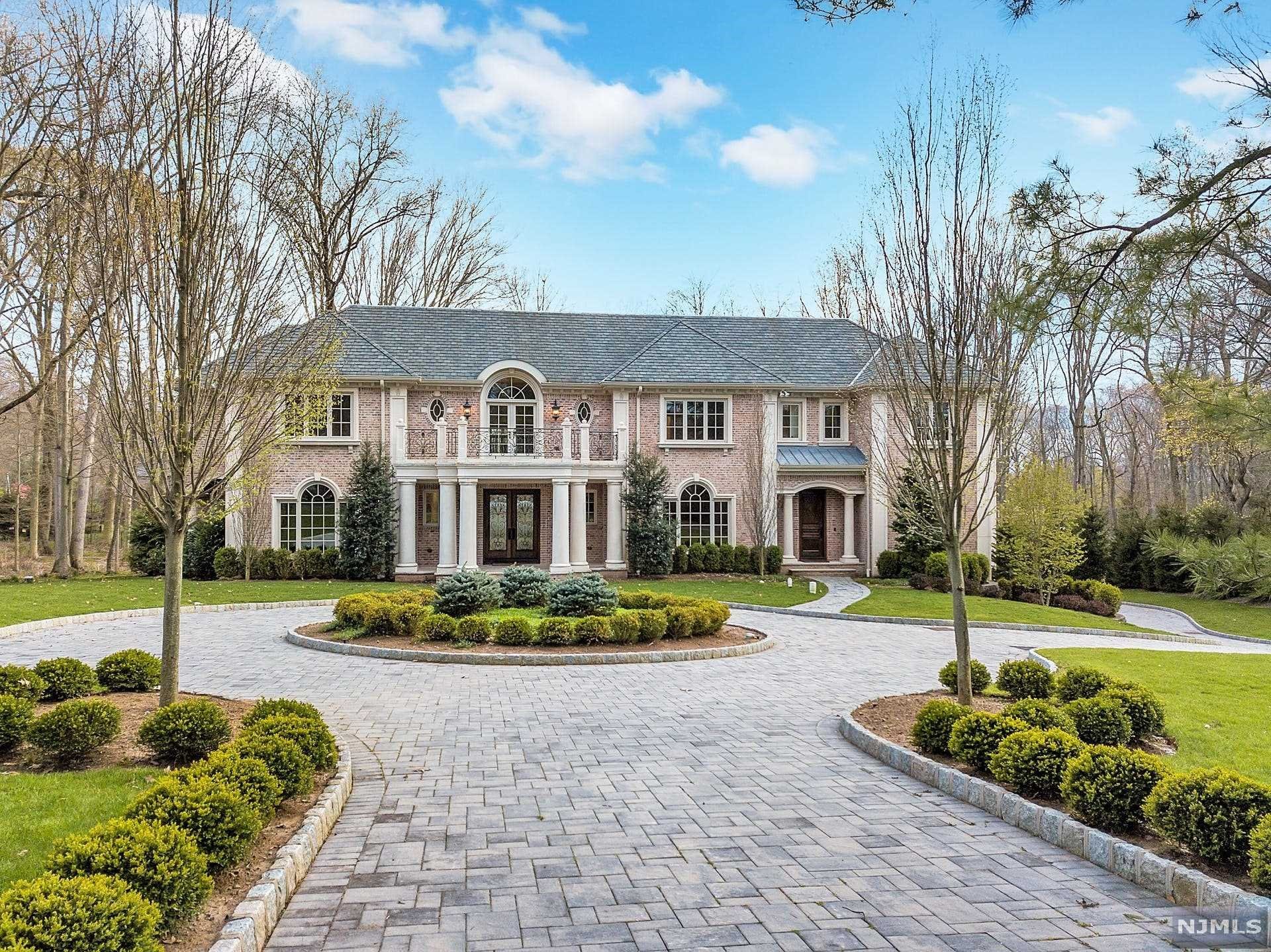 A signature expression of prestigious master builder Joseph Di Staulo's vision for modern luxury living and his 40 years of experience, 46 Westerly is an exquisite 16,000 sq. ft brick grand manor graciously spread across 3 levels with a 4-car heated garage & elevator in the sought-after Chestnut Ridge area of Saddle River. Its 8 bedrooms and 11 full and 3 half-bathrooms are united by a 2-level Carrara marble foyer distinguished by an elegant sweeping staircase. This 2.4 acre lot is framed on all sides by a variety of mature trees and sits on an intimate street with no through traffic. 10 year Home Buyer's Warranty effective at closing. FEATURES INCLUDE: GRAND MANOR SHINGLE ROOF, PAVER DRIVEWAY WITH FRONT CIRCULAR ENTRANCE, DRAMATIC ENTRY FOYER, BREATHTAKING MASTER BEDROOM SUITE, SEVEN BEDROOM SUITES, SPECTACULAR FORMAL ENTERTAINING ROOMS, CHEF'S DREAM KITCHEN WITH STATE OF THE ART STAINLESS STEEL APPLIANCES, THEATER, GYM, LOUNGE ROOM WITH INDOOR SPA, ELEVATOR, PATIO