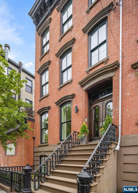 Quintessential townhouse, lovingly restored & renovated. 5 story/5 bedroom, 20' wide, historic turn-of the-century brownstone townhouse exemplifies the seamless integration of timeless modern design with the home's original historic details. Completely renovated, restored & reconfigured into a 2 family home - now includes an owner's triplex, a garden level apartment, & cellar w/ 6' high ceilings for storage and utilities. The current owners use the home as a one family with guest suite and family room. Tucked away just a block from Washington Street this home offers an abundance of convenience with easy access to boutique shopping, restaurants, cafes and Hoboken's 14th Street NY Waterway Ferry and NJ Transit for access to Hudson Yards and Manhattan's Port Authority bus terminal and Path Train to NYC.