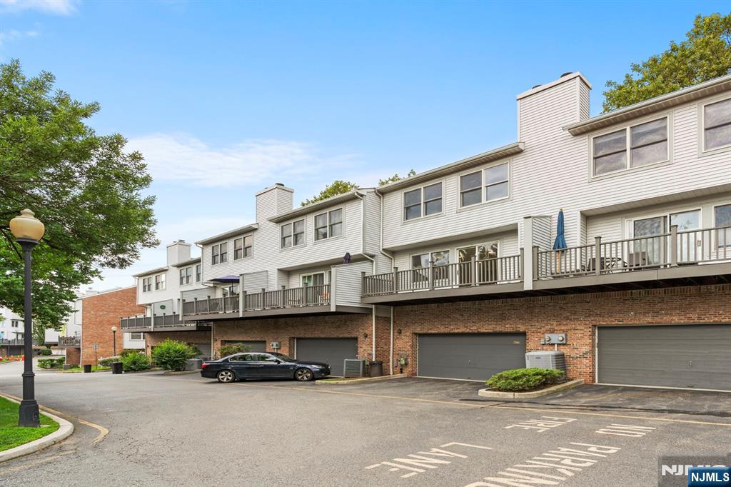 Please Call/Text Rita Hsing @ 646-639-2856 for questions or showing appointment. Welcome to 477 Undercliff Avenue, a beautifully maintained 3-bedroom, 2.5-bath townhome in the desirable Panorama community of Edgewater. Freshly painted and move-in ready, this spacious residence offers an ideal blend of comfort, style, and convenience. The main level features an open and inviting layout with generous living and dining areas, perfect for everyday living and entertaining. The well-appointed kitchen provides ample cabinetry and workspace, while large windows fill the home with natural light. Upstairs, the primary suite offers a private retreat with an en-suite bath and abundant closet space, complemented by two additional bedrooms and a full bath. A two-car garage provides convenient parking and extra storage. Enjoy easy access to NYC transportation, shopping, dining, waterfront parks, and all that Edgewater has to offer. Don't miss this exceptional opportunity to own in one of Edgewater's most sought-after communities.