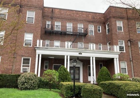 Minutes from Manhattan! This well-maintained mid- rise building is sure to impress. Move-In Ready. Spacious third floor unit w/ LARGE rooms, HIGH ceilings & Big closets. Lovely entry foyer/ convertible dining-area. Eat-in Kitchen, lot's of storage & Hardwood floors. Spacious Bedroom has two closets. Building amenities include: on-site basement laundry, updated hallways, lobby & manicured grounds. NYC bus right outside your door. Near to shopping, all major highways, Houses of Worship & Holy Name Hospital. Subject to board approval. Street Parking. Walk-up style - no elevator. Ownership without the stress! Welcome home!