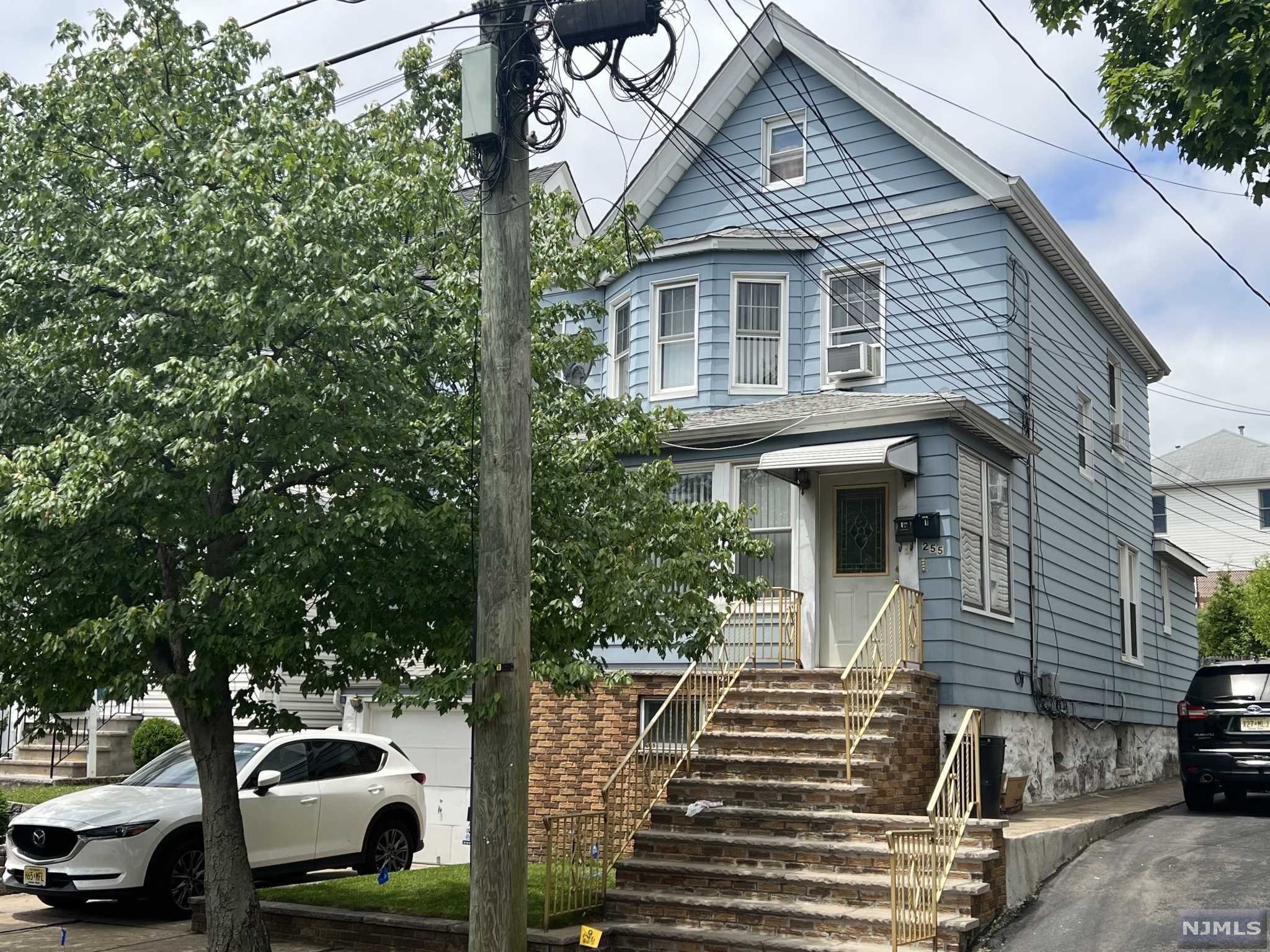 Back on the Market due to Buyer's Non-Performance. Excellent opportunity to live free and collect rent or just as an investment. Two family home waiting for your personal touches with 3 bedrooms on the first floor and 2 on the second with added living space on the third floor. High finished basement with full bath and recreation room. Garage, driveway and nice size yard to enjoy the warmer days ahead. Excellent location in the Roosevelt school district, close to everything including transportation, shopping, parks and houses of worship. 2 blocks to buses 38 & 76, 3 blocks to #40 bus that takes you to Harrison PATH in 15 minute.