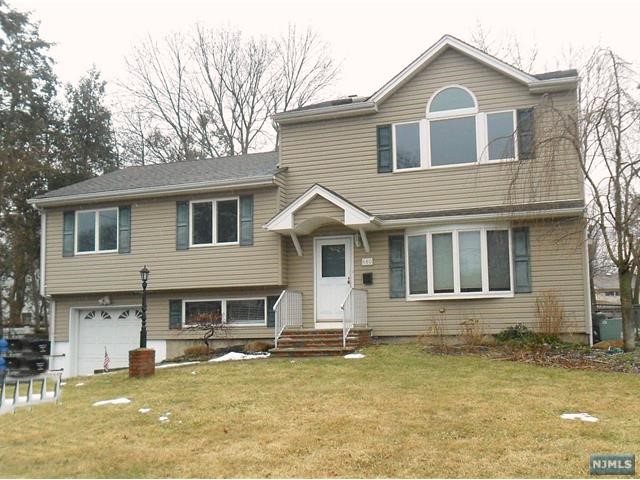 Stunning Expanded Split level home with five levels. Four Bedrooms and Four bathrooms - Salt water outdoor pool is private and amazing. Includes an office room and recreation room. Will not last!!!