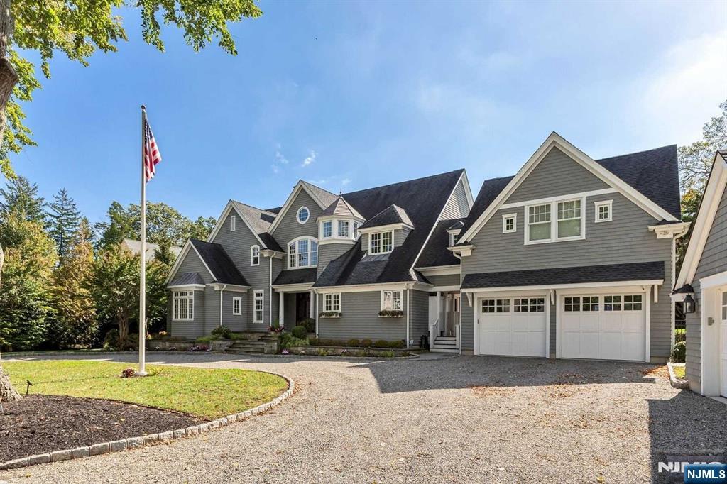 This waterfront home is the epitome of luxury and style set on .495 acre showcasing views of the Toms River from all rooms. This pristine residence was custom built with extraordinary attention to detail & quality offering 13 rooms. The main level offers an open floor with great room w/fpl,chef's kitchen,formal dining area & primary suite,plus 2 powder rooms & laundry room. The second level is complete with an additional primary suite plus 4 additional bedrooms,with 2 full baths.The lower level offers a recreation room w/fpl,media area,gym,billiard room,bar & sun room. The property features a private beech, extended lighted dock, pool, firepit, outdoor kitchen, serving bar w/TV & manicured landscaping. The interior was designed with an open floor capturing river views from all rooms. There is an additional lot across the street that is included in sale. Relax and enjoy the sailing races on the river every Saturday. This home is complete with all amenities.