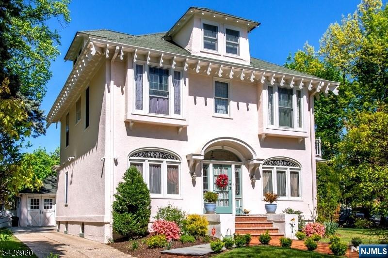 A Spanish Mediterranean Colonial, Circa 1924 @ Historic 7 Oaks. Original Oak/Mahogany Ribbon inlaid flooring, Picture Moldings, Stained Glass Beveled & Leaded windows. A Roof Line Adorned w/Hand carved Tail Rafters surround both house and garage. Oak Moldings and Trim as originally intended. On nearly a 1/2 Acre Park like Setting. Entrance Vestibule access a Foyer w/Corinthian Columns And a Unique Standard, A Formal Living Room and Parlor. The Parlor's Wood Beamed Ceiling, Arched Windows & Leaded Glass French Doors access a Solarium. A Walled Windowed, light filled space & Garden View Perfect for sitting, reflections or Afternoon Teas. The Parlor, currently utilized as a Billiard Room, thru Oak Pkt. Doors enter a Formal Dining Room w/6 Ft. Oak Wainscot Walls & Wood Beamed Ceiling. A Formal Living Room w/Tray Ceiling & Leaded Glass Bay Window. The Kitchen W/ Breakfast Area, Porcelain Italian Mosaic floor & Service or Back Stairs access the 2nd Fl. Privacy areas of the Residence. French Doors lead to a Slate Patio, 2 Car Detached Garage, formally a Carriage House and Beautifully Landscaped Yard all represent the first level. 2nd Fl. with a Lavish Bath and Bedrooms, there are 4. 2 Front facing w/ Picture Moldings, Leaded Glass Windows, Window seats & 2 Bedrooms w/ Deck access. 3rd Fl Primary Suite with Vaulted Ceiling, Oak Floor, Window Seats & Marble Bath. Basement w/ Laundry Rm, Full Bath & Storage. Access to 3 NYC Direct Train Stations, Rt 280 & the GSPKWY.