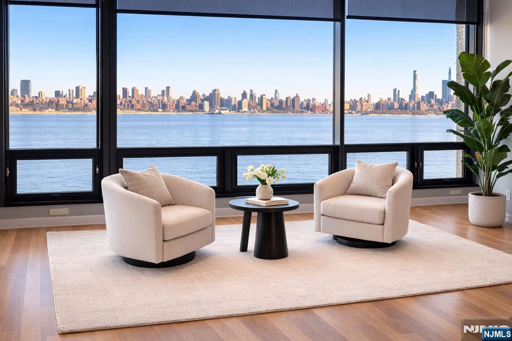 Get ready to enjoy an ultra luxury living style in this water front gem: Super spacious and all open-plan high floor unit, floor-to- ceiling windows let you see the sun rise, the full Hudson River view and the incredible skylines of Manhattan. Gorgeous gourmet kitchen with center island and all top-of -the line appliances. Plenty of closets in unit. 24 hour concierge, fitness center, heated pool and one parking space. Walk to all amazing restaurants, shops and super markets.