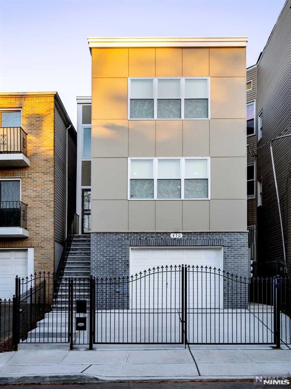 Welcome to this modern contemporary multi-family home that was constructed in year 2022. Unit 1 features 3 bedrooms, 2.5 bathrooms, While unit 2 offer 3 bedrooms and 2 full baths, beautiful wood flooring, and an updated kitchen and built-in cabinets. Situated in a prime location with excellent public transportation options, the property is perfect for both homeowners and investors. With nearby schools, shopping, and a walkable neighborhood, it combines style, functionality, and accessibility. Don't miss the opportunity to own this exceptional home! Photos were taken before the tenants moved in.