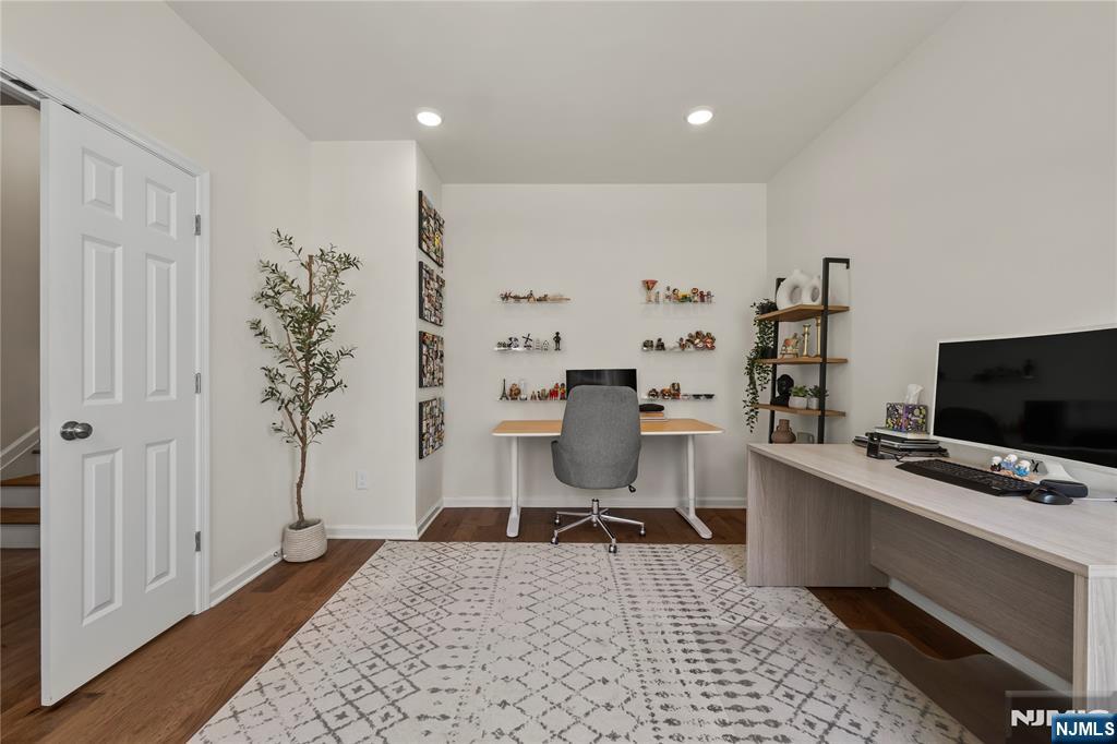 Available July 1st â€“ Welcome to 65 Landmark ln in Fair Lawn, an east-facing 4-bedroom, 2.5-bath home on a tree-lined street in the sought-after Radburn community. The first floor features a bright entry foyer, a flexible guest room/home office, coat closet with direct access to a 2-car attached garage with epoxy flooring. The second floor offers living, dining, and kitchen areas with hardwood floors, a powder room, a massive pantry, and a balcony off the kitchenâ€”perfect for entertaining. The third floor includes a primary en-suite, two additional bedrooms, a full bath, and upper-level laundry. As a Radburn resident, enjoy pools, tennis courts, parks, trails, playgrounds, and social events, all near shopping, dining, top-rated schools, and NYC transportation. A rare, nearly-new home in one of Fair Lawnâ€™s most vibrant neighborhoodsâ€”schedule your private tour today! Showing starts from June 15th only with no exception!