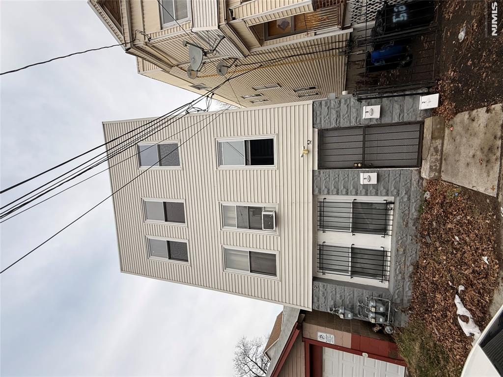 Fully renovated in 2020, this spacious and bright three-family home is located in a rapidly growing area and offers an excellent opportunity for both investors and owner-occupants. This classic three-story property features three well-designed units, each offering an open floor plan with 3 bedrooms, 1 full bathroom, an eat-in kitchen, and a generously sized living room.Extensive upgrades completed in 2020 include new plumbing, updated electrical systems, new mechanicals, new windows, and a newly installed front sidewalk. Each unit boasts modern kitchens with soft-close cabinetry, granite countertops, and stainless steel appliances. Additional features include forced hot air heating, a combination of laminate flooring and ceramic tile throughout, and bright, comfortable living spaces.The property offers separate utilities for each unit, making it an ideal income-producing investment with affordable property taxes. Conveniently located near schools, shopping centers, and public transportation with easy access to New York City.