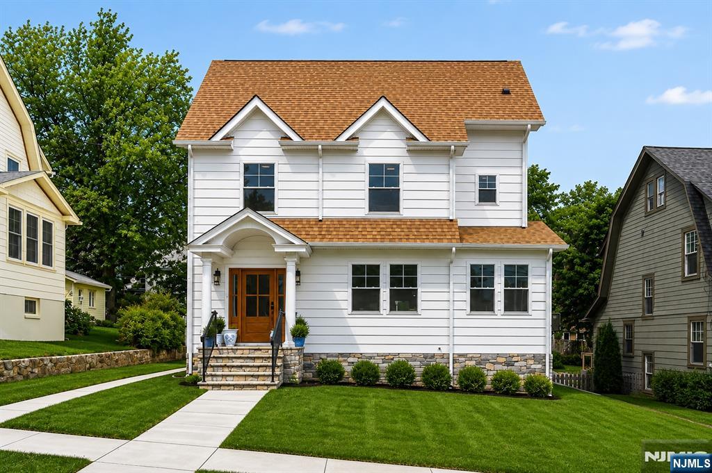 Nestled in the highly sought-after Gregory section of West Orange, this beautifully renovated home offers 4 bedrooms, 4.5 bathrooms & 4 finished levels of thoughtfully designed living space. Surrounded by manicured landscaping, the home blends timeless charm with modern functionality. Sun-filled living & dining areas feature crown molding throughout and striking wood-slat accent walls leading up the staircase. The formal dining room showcases a coffered ceiling, while the designer kitchen is appointed w/ quartz countertops, waterfall center island, stainless steel appliances, spacious walk-in pantry & a butlerâ€™s pantry with separate sink, ideal for kosher-friendly use. Sliding glass doors off the living room open to the rear deck for seamless indoor-outdoor living. A spacious sitting room, private office & powder room complete the main level. The second floor features 4 generously sized bedrooms and 3 full bathrooms, including a primary suite w/ private bath & convenient laundry room. The finished third floor offers flexible bonus space ideal for a private office, guest retreat or additional recreation area. The finished lower level includes a sprawling recreation room, full bath & abundant storage, perfect for a media room, gym or play space. Enjoy the convenience of a free jitney to NY trains, Midtown Direct bus access & close proximity to South Orange Village, Millburn, Trader Joeâ€™s & the South Mountain Recreation Complex.