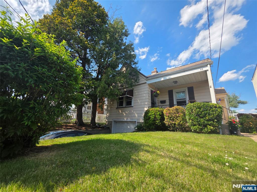 This bright, airy 4-bedroom, 2-bath Cape Cod offers easy living with a full basement and built-in 1-car garage. The expansive yard is perfect for entertaining, gardening, or play. A solid, versatile home with tons of potential and space to grow.
