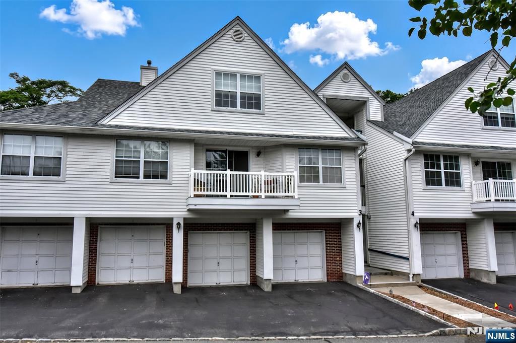 Discover a truly special setting at this beautiful 2-bedroom, 2-bath ground-level condo featuring the rare convenience of a private 2-car garage with direct access to the unit. The highlight of this home is its serene outdoor backdropâ€”a peaceful babbling brook winding through a lush landscape of mature trees and greenery, creating a private, tranquil retreat right outside your door. Enjoy morning coffee or evening relaxation on the rear deck while taking in the soothing sounds of nature and picturesque views year-round. Inside, the home features an open and spacious floorplan with beautiful flooring throughout, creating a warm and modern feel. The Riverside community is located in the town of Waldwick which offers a town pool, parks, retail and restaurants. Combining comfort, convenience, and a picturesque natural setting, this exceptional home offers a unique opportunity not often found in condominium living.
