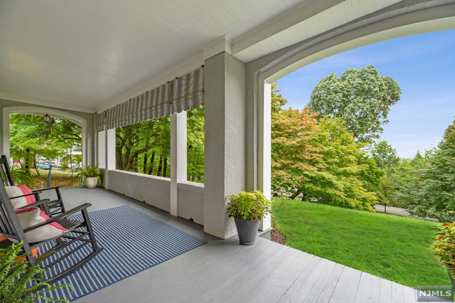 JUST AMAZING! Overlooking NYC skyline on a quiet, coveted tree-lined street, you'll swoon at the updates, stature & charm of this Montclair gem. Modern amenities compliment sophisticated architectural detail for an impressive home you can't stop thinking about. New Chef's Kitchen with large island, built-in eating area, top of the line appliances & mudroom with custom lockers. 3 new baths. Built-ins, exquisite windows, moldings, stunning stairway, decorative fireplaces for oodles of character! Attached Greenhouse Rm used as Yoga Studio. Almost an acre of property with 2 patios, views & flat side yard with plenty of room for a pool. Screened-in & open front porches, chicken coop, additional glass enclosed outdoor space attached to 3 car garage with potential for studio/rec space above. Unfinished basement with scads of headroom. Blocks to Downtown, NYC bus & 1.1 mile to train. Newer C/A, furnace, water heater, driveway, water softener system. See floor plans, 3D tour & video.