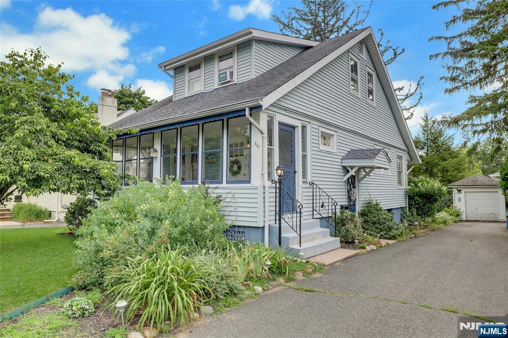 * Highest and Best offers by Tuesday, July 21 at noon. Charming well-maintained colonial situated in a quiet neighborhood just minutes from Ridgewoodâ€™s schools, vibrant downtown, beautiful parks, and convenient transportation, making it an ideal place to call home. Lovingly maintained by current owner for over 58 years, this beautiful 1,260sf cape-cod colonial style home features: Hardwood flooring, amazing chestnut trim, stain glass window on staircase, open floorplan great for entertaining, sun-filled 3-season front porch, and a 50x125 lot for potential expansion. House/Garage AS-IS with no known issues