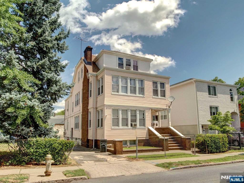 Welcome to this fantastic investment opportunity! This spacious three-family home sits on a double lot with dimensions of 69' x 115', offering ample potential for development or additional parking. The owner and tenants have maintained the property in excellent condition, making it move-in ready for the next homeowner. This home offers a total of 6 bedrooms and 3.5 bathrooms, not including large spaces in basement. Located on a desirable street just minutes from the Seven Oaks section, main roads, and public transportation, this property is ideally situated. The basement provides a great entertainment space with plenty of room. This is a must see property, come and explore its potential as soon as possible!