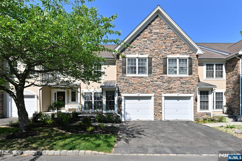 WOW ! Your own legitimate "Lakeside" townhouse! Rare opportunity to own a unit at the highly sought after Lakeside Community in North Haledon with a 'Million Dollar Lake View' from your deck & patio ! Move in ready and available for you to enjoy this Summer! Features include: 3 BRs, 2.5 bathrms, open flow throughout 1st flr w/entry foyer, living rm, extendable dining rm, updated kitchen, family rm w/cathedral ceiling, gas fireplace, & palatial windows which, along with the sliding glass doors to the deck, offer you stunning views of the spectacular lake with mountain backdrop for you to destress and unwind with every day! The lake allows kayaking & fishing, & often gets visits from the local swans for even more visual beauty! The deck is spacious & private, as is the lower level patio for extra outdoor living & entertainment! The 2nd flr has 3 large BRs, the hallway Bathrm, Laundry, & Primary suite w/His & Hers closets & large primary Bathrm! The fabulous ground flr/Bsmt offers endless usage options including Rec Rm, Play Rm, Gym, Media Rm & more - even a private bonus rm for home office! All this & the amazing Lakeside amenities including clubhouse & pool table, large fitness center, pool with hot tub also overlooking the lake, tennis courts, & of course the stunning private Lake to enjoy! Great location for NYC Commuters! This is a MUST SEE & a rare opportunity to purchase a home in an elite community, on a quiet cul-de-sac, with spectacular Lake Views! DONT MISS THIS ONE!