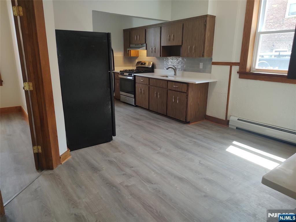Renovated 2-bedroom apartment located on the 1st floor. Spacious eat-in kitchen with new countertops and a new stove. Large kitchen pantry. High ceilings and crown moldings. New vinyl driftwood plank floors, new energy efficient windows, new electric outlets, new baseboards, new thermostat, and energy-efficient LED lights. Large Cedar closet. Washer/dryer hookups available, if connected are an additional $35 per month. Apartment is filled with natural light. Quiet and clean building. Conveniently located to major highways, close to public transportation, restaurants, and all your shopping needs within minutes. Good credit, income check. No pets. No smoking of any kind.