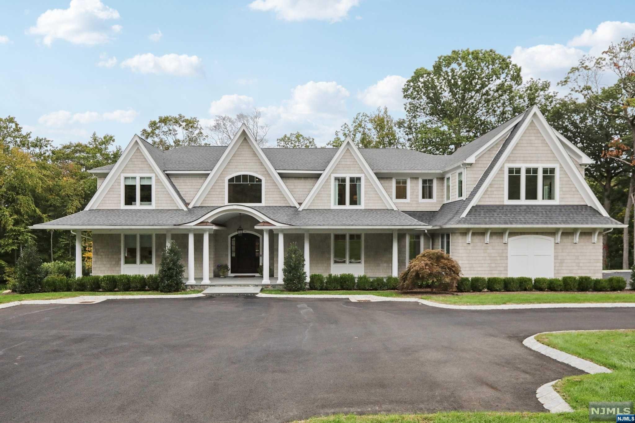 Better Than New Callori Architect designed 5 BR, 6 full/ 2 half bth home has everything the most discerning buyer is looking for. Completed in 2022, this 7000 sq ft home sits on a beautiful 2.17 acre lot on a private cul de sac location. Gourmet Peter Salerno Kitchen w exquisite details incl floor to ceiling custom cabinetry & 2 large center islands. Adjacent Breakfast Rm & Family Rm w cathedral ceilings & stunning oversized windows, looking at your private rear deck & yrd. Spacious Great Rm w coffered ceiling & fpl,access to rear deck, Formal Din Rm, Beautiful Library/Office & incredible Bar add to the ambiance & flow of 1st flr w 10 foot ceilings. Walk in pantry, spectacular mud rm, Front & Back staircases & more! Upstairs 5 en suite BRs, incl the Primary w tray ceiling, gas fpl, gorgeous bath & incredible walk in closets. Large 2nd floor laundry. Full, unfinished walk out lower level leads to covered patio area. See virtual tour for details